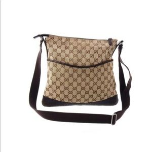 Gucci. Canvas and leather brown messenger bag.